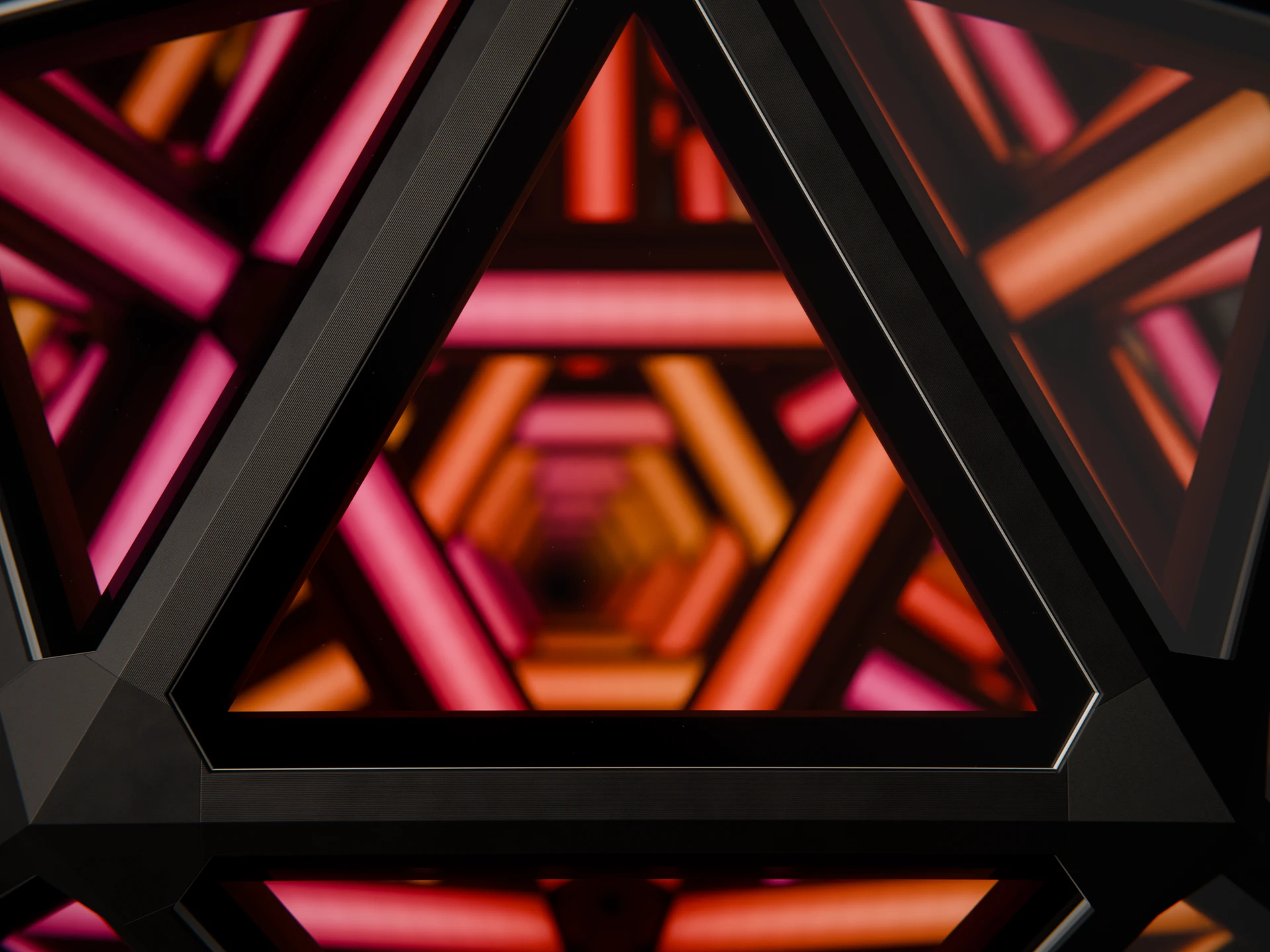 Close-up of a mirrored face with lines of light repeating into the distance.